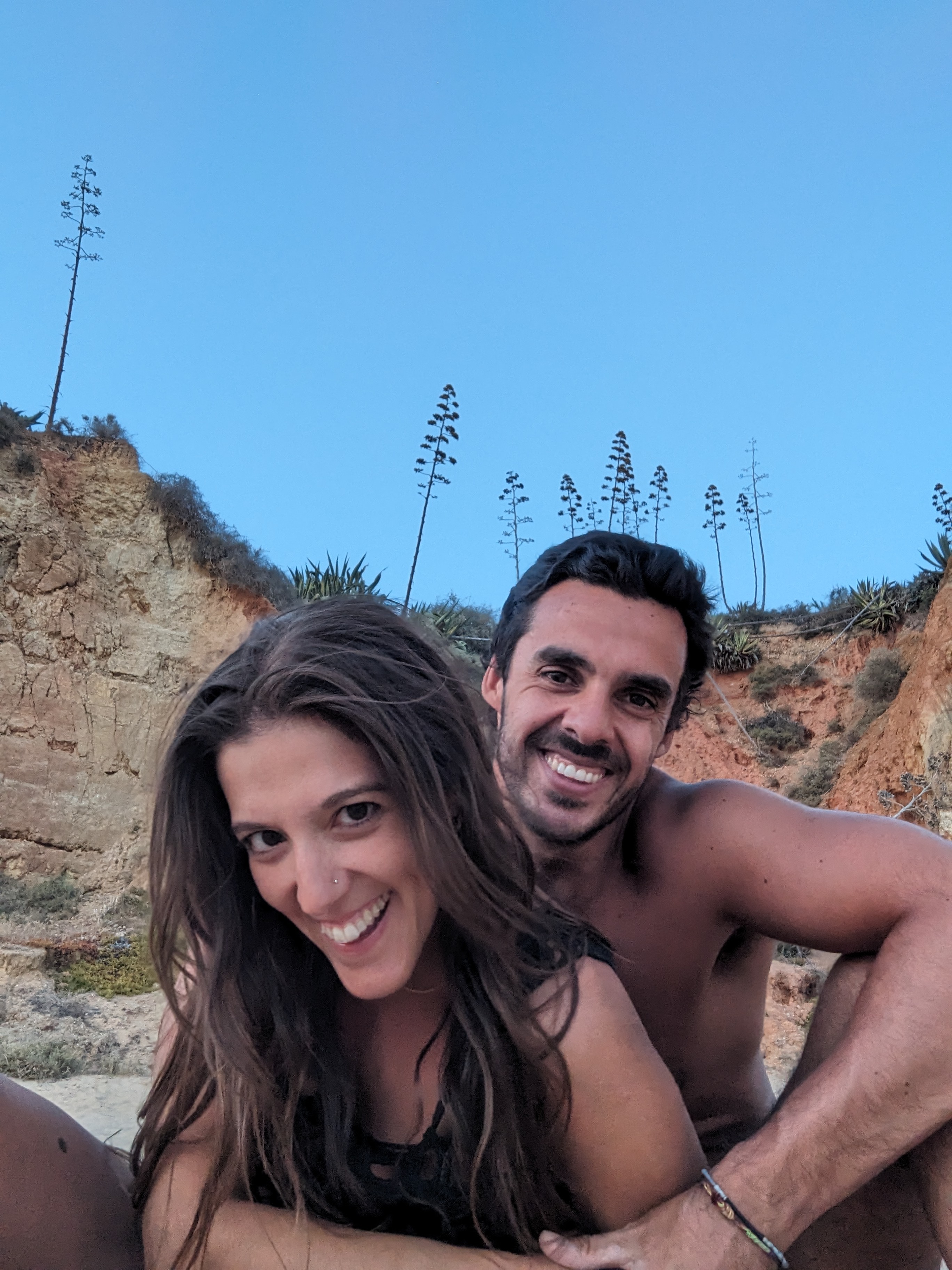 Couple dancing at sunset.